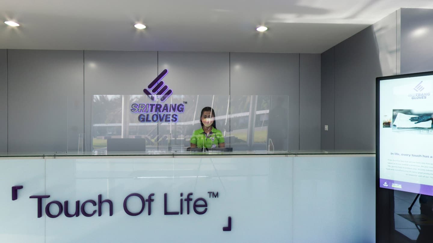 Sri Trang Gloves reception desk and branded entrance area