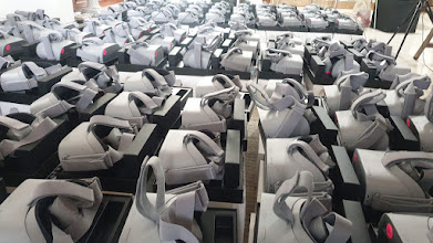 Rows of Oculus Go headsets arranged on boxes for GSK